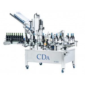 https://www.techni-contact.site/ressources/images/produits/merchandising/etiqueteuse-et-sertissage-pour-bouteilles-25299448-1.jpg - Cadence d'étiquetage : Jusqu'à 1500 bouteilles/heures