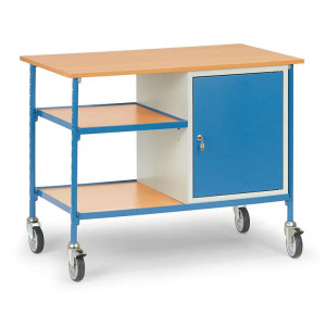 https://www.techni-contact.site/ressources/images/produits/merchandising/table-roulante-avec-2-plateaux-et-1-placard-16436568-1.jpg - Charge : 150 Kg - Hauteur table 910 mm - Plan de travail en mélaminé
