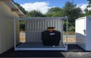 Abri stockage pour conteneur à huiles moteurs