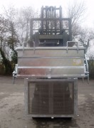 Benne à fond perforé pour filtration