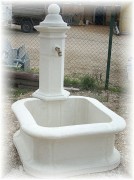Fontaine murale en pierre reconstituée