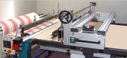 Machine de matelassage multi-plis