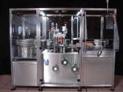 Machine de remplissage et d'emballage flacon