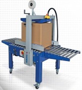 Machine pour fermeture de caisses