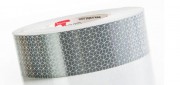 Bande prismatique pour véhicule