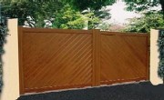 Portail aluminium ton bois plein droit coulissant