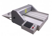 Raineuse micro perforeuse automatique
