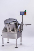 Redresseur auto de flacons pour l'alimentation automatique