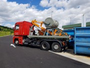 Rouleau compacteur sur berce