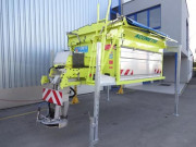 Saleuse portée à extraction par tapis