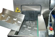 Tunnel de lavage pour pièces mécaniques