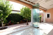 Rideau de verre coulissant pour terrasse